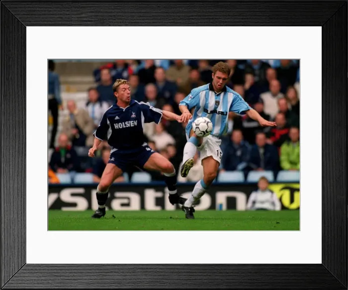 Framed Print : Clash at the Coventry: Eustace vs. Freund in FA Carling Premiership Showdown (Coventry City vs. Tottenham Hotspur, 14-10-2000) Framed Print : Clash at the Coventry: Eustace vs. Freund in FA Carling Premiership Showdown (Coventry City vs. Tottenham Hotspur, 14-10-2000)