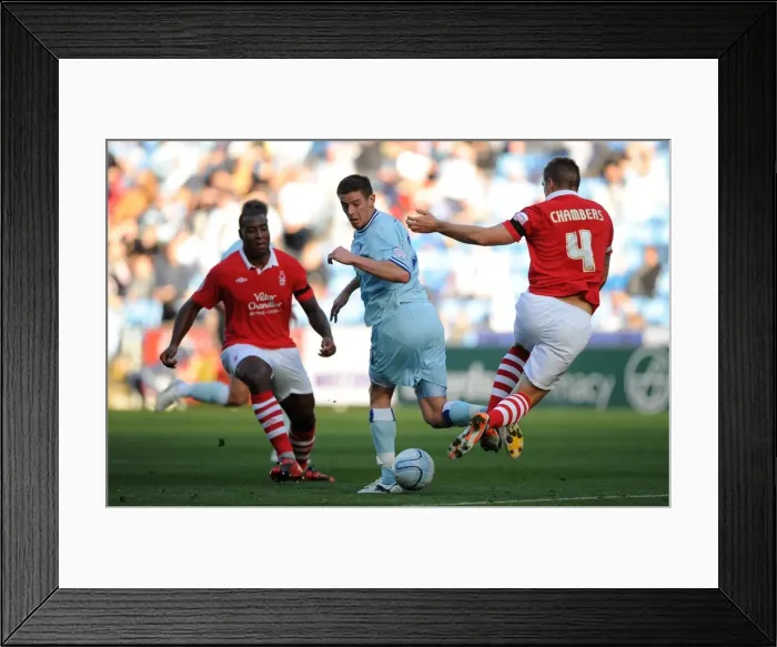 Framed Print : Championship Clash: Jutkiewicz vs. Chambers - Coventry City vs. Nottingham Forest Framed Print : Championship Clash: Jutkiewicz vs. Chambers - Coventry City vs. Nottingham Forest