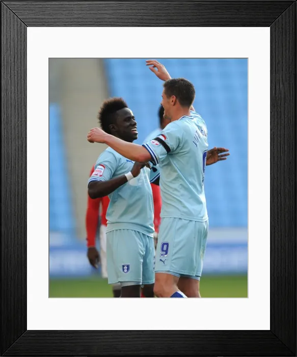 Framed Print : Coventry City FC: Lukas Jutkiewicz and Gael Bigirimana Celebrate Championship Victory over Nottingham Forest at Ricoh Arena Framed Print : Coventry City FC: Lukas Jutkiewicz and Gael Bigirimana Celebrate Championship Victory over Nottingham Forest at Ricoh Arena