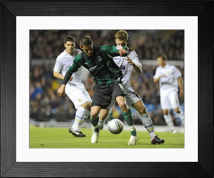 Framed Print : Battle for Supremacy: Jutkiewicz vs. Lees in the Championship Clash at Elland Road Framed Print : Battle for Supremacy: Jutkiewicz vs. Lees in the Championship Clash at Elland Road