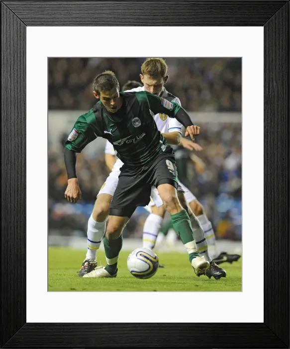 Framed Print : Battling for Supremacy: Jutkiewicz vs. Lees in the Npower Championship Clash between Leeds United and Coventry City Framed Print : Battling for Supremacy: Jutkiewicz vs. Lees in the Npower Championship Clash between Leeds United and Coventry City