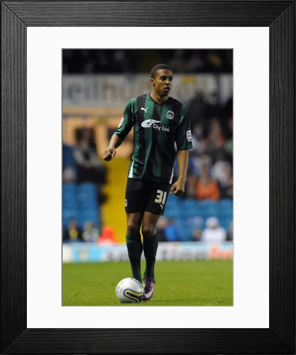 Framed Print : Cyrus Christie vs Leeds United: A Npower Championship Showdown at Elland Road (18-10-2011) Framed Print : Cyrus Christie vs Leeds United: A Npower Championship Showdown at Elland Road (18-10-2011)