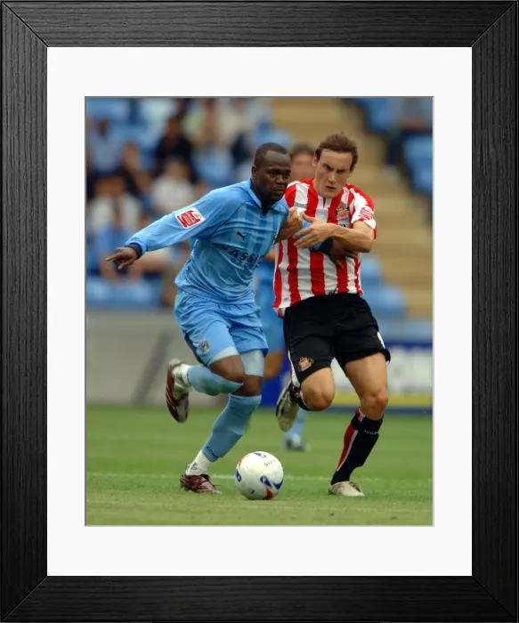 Framed Print : Coventry City vs Sunderland: A Championship Battle - Ricoh Arena (Stern John vs Dean Whitehead, 2006) Framed Print : Coventry City vs Sunderland: A Championship Battle - Ricoh Arena (Stern John vs Dean Whitehead, 2006)