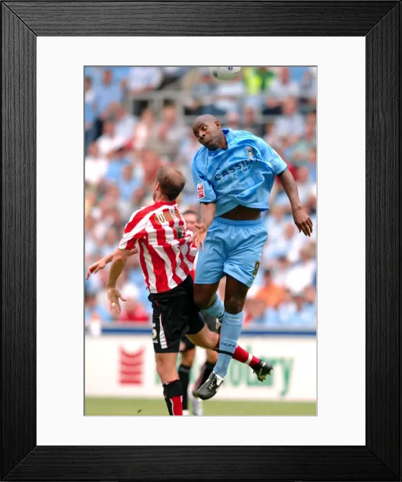 Framed Print : Clash in the Championship: Coventry City vs. Sunderland - Dele Adebola vs. Kenny Cunningham Aerial Battle (Ricoh Arena, 2006) Framed Print : Clash in the Championship: Coventry City vs. Sunderland - Dele Adebola vs. Kenny Cunningham Aerial Battle (Ricoh Arena, 2006)