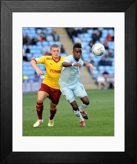 Framed Print : Battle for Supremacy: Coventry City vs. Burnley - Trippier vs. Bigirimana in Npower Championship Clash Framed Print : Battle for Supremacy: Coventry City vs. Burnley - Trippier vs. Bigirimana in Npower Championship Clash