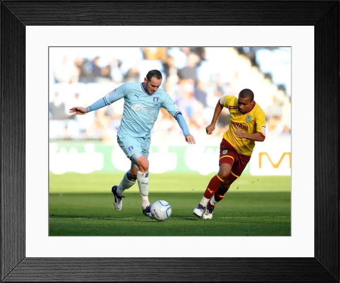 Framed Print : Coventry City vs Burnley: Clash at the Ricoh Arena - David Bell vs Junior Stanislas (Npower Football League Championship, 2011) Framed Print : Coventry City vs Burnley: Clash at the Ricoh Arena - David Bell vs Junior Stanislas (Npower Football League Championship, 2011)