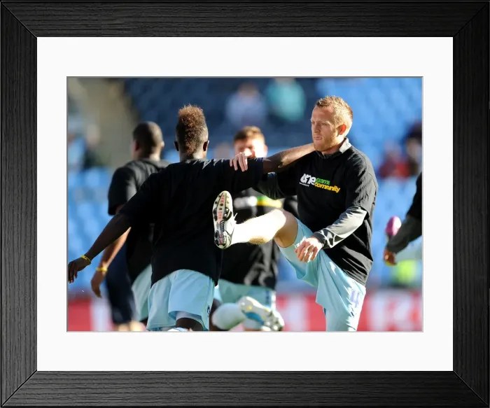 Framed Print : Warming Up: Gael Bigirimana and Sammy Clingan Prepare for Coventry City's Npower Championship Showdown Against Burnley (October 22, 2011, Ricoh Arena) Framed Print : Warming Up: Gael Bigirimana and Sammy Clingan Prepare for Coventry City's Npower Championship Showdown Against Burnley (October 22, 2011, Ricoh Arena)