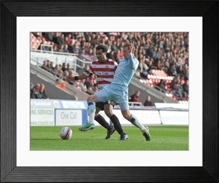 Framed Print : Keogh vs. Barnes: Intense Rivalry in Coventry City vs. Doncaster Rovers Npower Championship Clash Framed Print : Keogh vs. Barnes: Intense Rivalry in Coventry City vs. Doncaster Rovers Npower Championship Clash