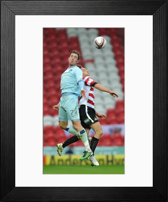 Framed Print : Richard Keogh Soars Over James Hayter in Coventry City vs Doncaster Rovers Npower Championship Clash Framed Print : Richard Keogh Soars Over James Hayter in Coventry City vs Doncaster Rovers Npower Championship Clash