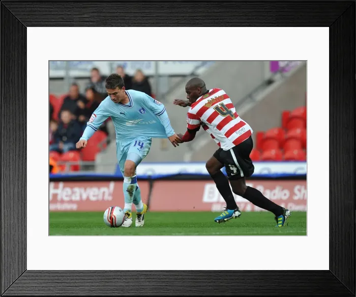 Framed Print : Intense Rivalry: Shelton Martis vs. Cody McDonald's Battle for Supremacy in Coventry City's Championship Clash at Doncaster Rovers Framed Print : Intense Rivalry: Shelton Martis vs. Cody McDonald's Battle for Supremacy in Coventry City's Championship Clash at Doncaster Rovers