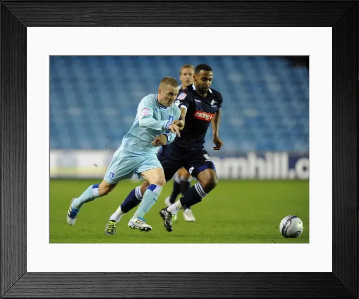 Framed Print : Battle for the Ball: McSheffrey vs. Trotter in the Intense Npower Championship Clash between Coventry City and Millwall Framed Print : Battle for the Ball: McSheffrey vs. Trotter in the Intense Npower Championship Clash between Coventry City and Millwall