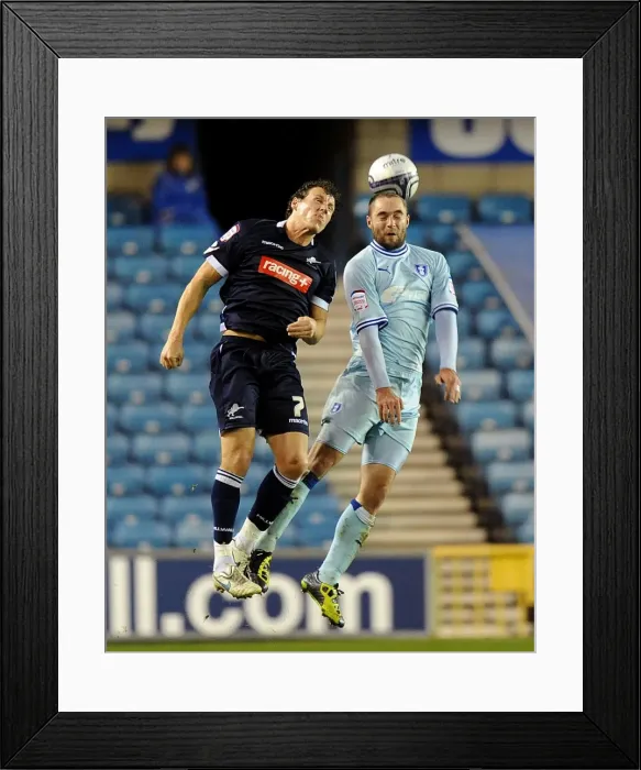 Framed Print : Battle for the Ball: Henderson vs. McPake in Millwall vs. Coventry City Championship Clash Framed Print : Battle for the Ball: Henderson vs. McPake in Millwall vs. Coventry City Championship Clash