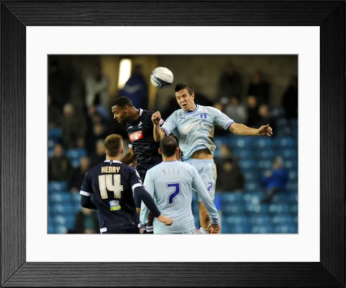 Framed Print : Battle for the Ball: Wood vs. Trotter in Millwall vs. Coventry City Championship Clash Framed Print : Battle for the Ball: Wood vs. Trotter in Millwall vs. Coventry City Championship Clash