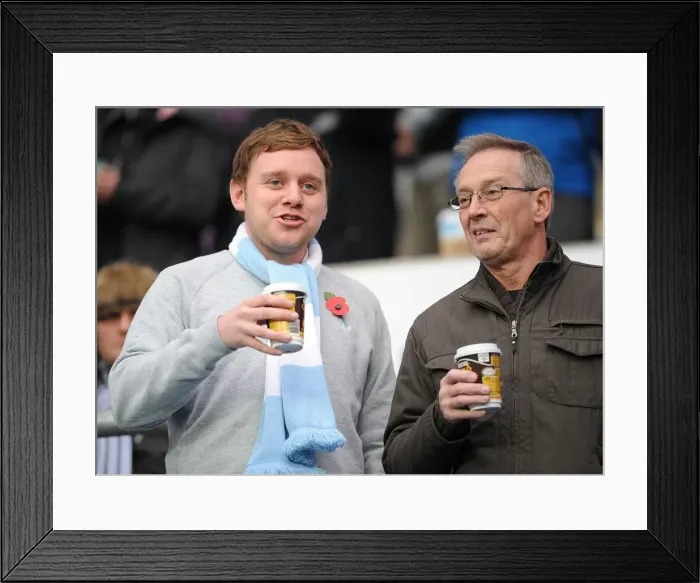 Framed Print : Coventry City Football Club: A Cozy Npower Championship Moment - Fans Savoring Hot Drinks at Ricoh Arena Framed Print : Coventry City Football Club: A Cozy Npower Championship Moment - Fans Savoring Hot Drinks at Ricoh Arena