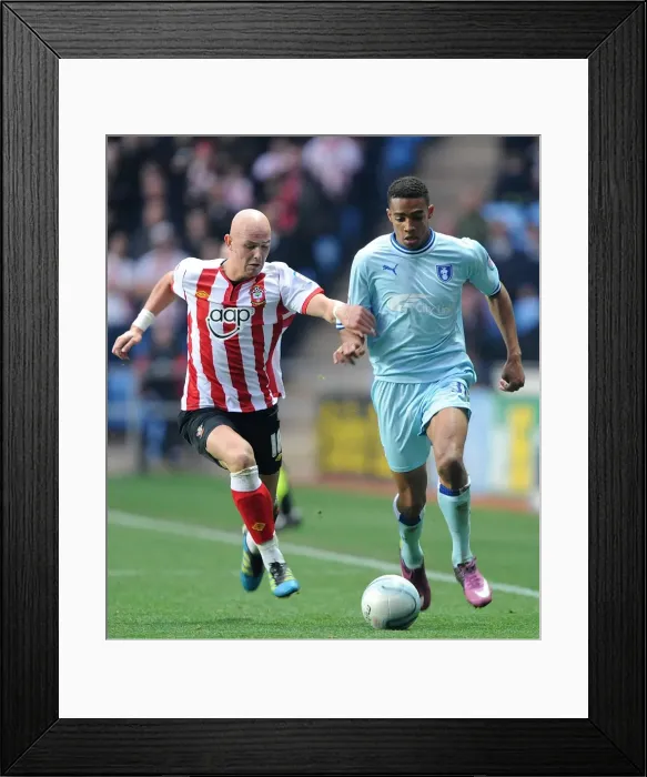 Framed Print : Intense Rivalry: Cyrus Christie vs. Richard Chaplow - Coventry City vs. Southampton (Npower Championship, 05-11-2011, Ricoh Arena) Framed Print : Intense Rivalry: Cyrus Christie vs. Richard Chaplow - Coventry City vs. Southampton (Npower Championship, 05-11-2011, Ricoh Arena)