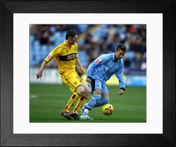 Framed Print : Clash of the Midfielders: Darren Currie vs. Chris McCann (Coventry City vs. Burnley, 09-12-2006) Framed Print : Clash of the Midfielders: Darren Currie vs. Chris McCann (Coventry City vs. Burnley, 09-12-2006)