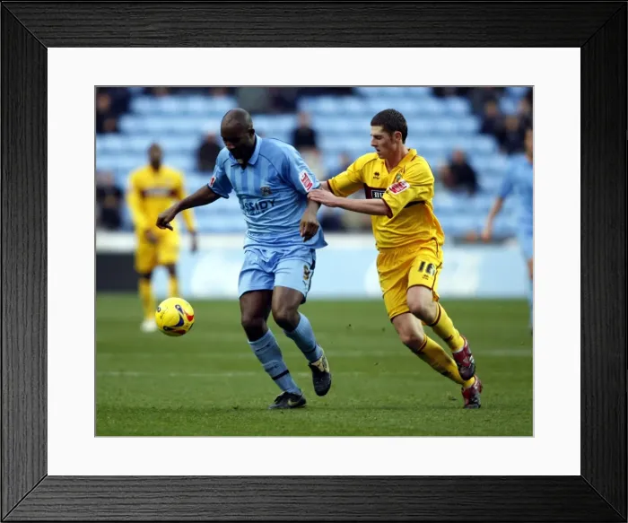 Framed Print : Clash of the Titans: Dale Adebola vs. Chris McCann, Coventry City vs. Burnley (09-12-2006, Ricoh Arena) Framed Print : Clash of the Titans: Dale Adebola vs. Chris McCann, Coventry City vs. Burnley (09-12-2006, Ricoh Arena)