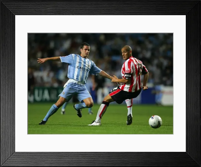 Framed Print : Michael Doyle of Coventry City Outwits Nigel Quashie with a Clever Pass (2005) Framed Print : Michael Doyle of Coventry City Outwits Nigel Quashie with a Clever Pass (2005)