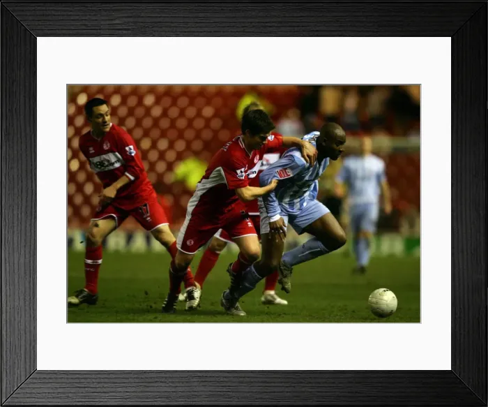 Framed Print : Dele Adebola vs. Chris Riggott: Coventry City's FA Cup Battle at Middlesbrough (08-02-2006) Framed Print : Dele Adebola vs. Chris Riggott: Coventry City's FA Cup Battle at Middlesbrough (08-02-2006)