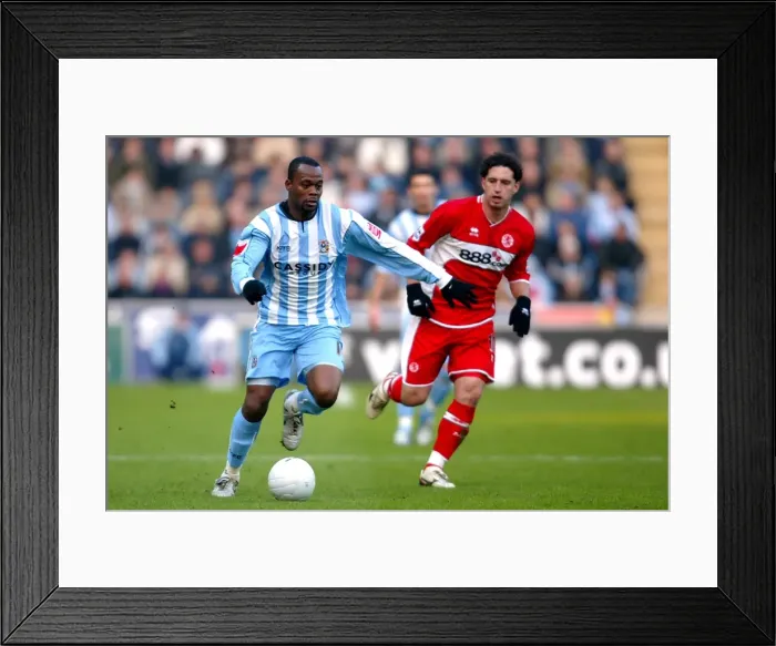 Framed Print : Stern John Surges Past Fabio Rochemback: Coventry City vs. Middlesbrough in FA Cup Fourth Round, Ricoh Arena (2006) Framed Print : Stern John Surges Past Fabio Rochemback: Coventry City vs. Middlesbrough in FA Cup Fourth Round, Ricoh Arena (2006)
