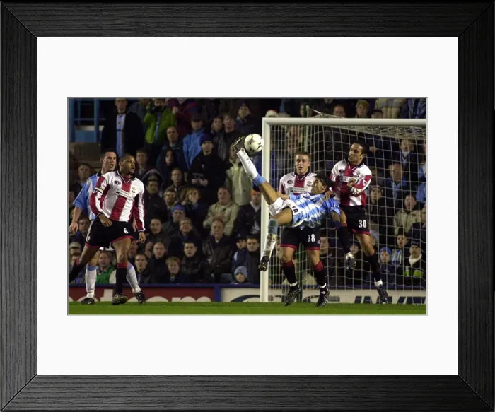 Framed Print : Moustapha Hadji's Epic Overhead Attempt vs Southampton (FA Premiership, Coventry City, 22-12-2000) Framed Print : Moustapha Hadji's Epic Overhead Attempt vs Southampton (FA Premiership, Coventry City, 22-12-2000)