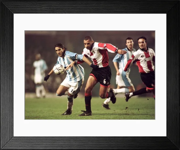 Framed Print : Intense Battle for Possession: Hadji vs. Richards at Highfield Road (Coventry City vs. Southampton, FA Premiership) Framed Print : Intense Battle for Possession: Hadji vs. Richards at Highfield Road (Coventry City vs. Southampton, FA Premiership)