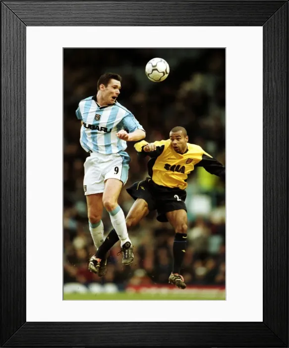 Framed Print : Clash at the Coventry: Roussel vs. Cole - A Premier League Battle (03-02-2001) Framed Print : Clash at the Coventry: Roussel vs. Cole - A Premier League Battle (03-02-2001)