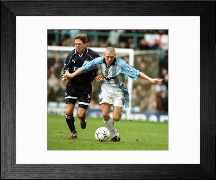 Framed Print : Craig Bellamy Evades Thordur Gudjonsson: Coventry City vs. Derby County (31-03-2001) Framed Print : Craig Bellamy Evades Thordur Gudjonsson: Coventry City vs. Derby County (31-03-2001)