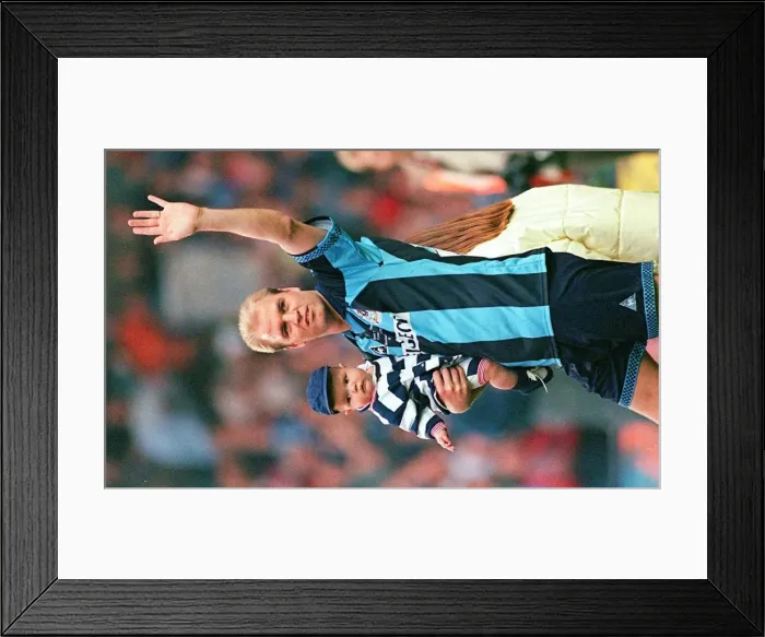 Framed Print : A Heartfelt Moment of Gratitude: David Busst and Son Cobi Thank Crowd at Coventry City's Benefit Match vs. Manchester United (1990s) Framed Print : A Heartfelt Moment of Gratitude: David Busst and Son Cobi Thank Crowd at Coventry City's Benefit Match vs. Manchester United (1990s)