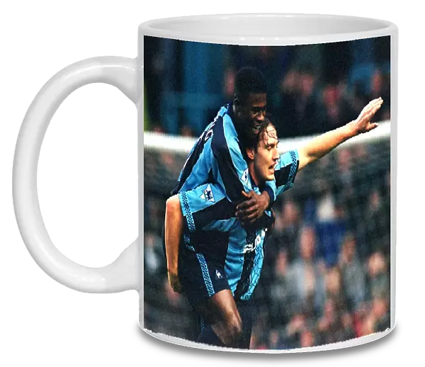 Coventry City FC's Historic Upset: Noel Whelan and George Boateng Celebrate Goal Against Manchester United (FA Carling Premiership, 1997)