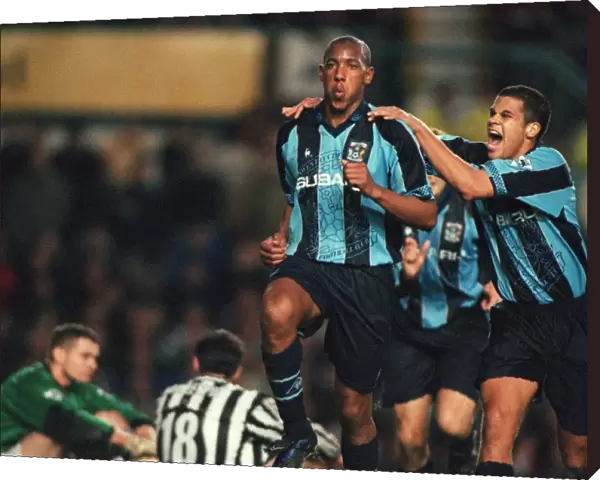 Dion Dublin Scores His Second Goal: Coventry City's Triumph Against Newcastle United (FA Carling Premiership)