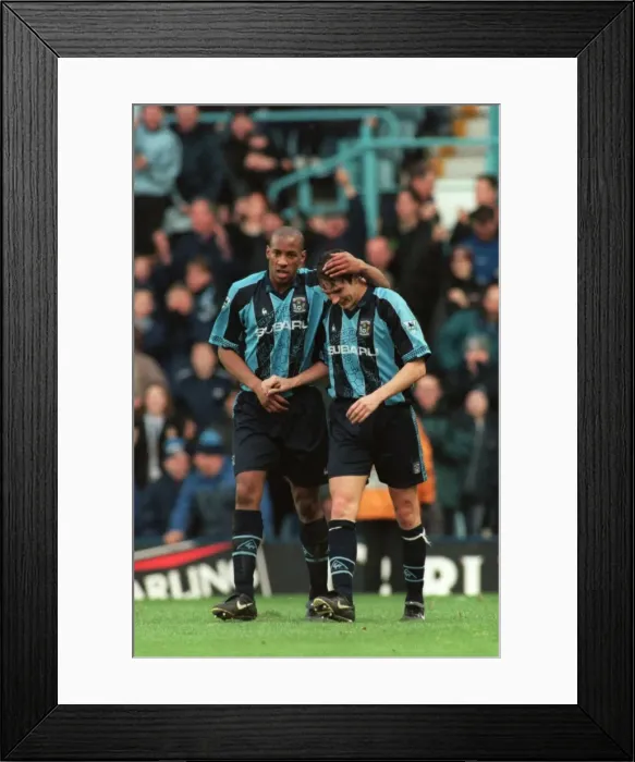 Framed Print : Unforgettable Moment: Dion Dublin and Noel Whelan's Epic Goal Celebration vs. Arsenal (FA Carling Premiership) Framed Print : Unforgettable Moment: Dion Dublin and Noel Whelan's Epic Goal Celebration vs. Arsenal (FA Carling Premiership)