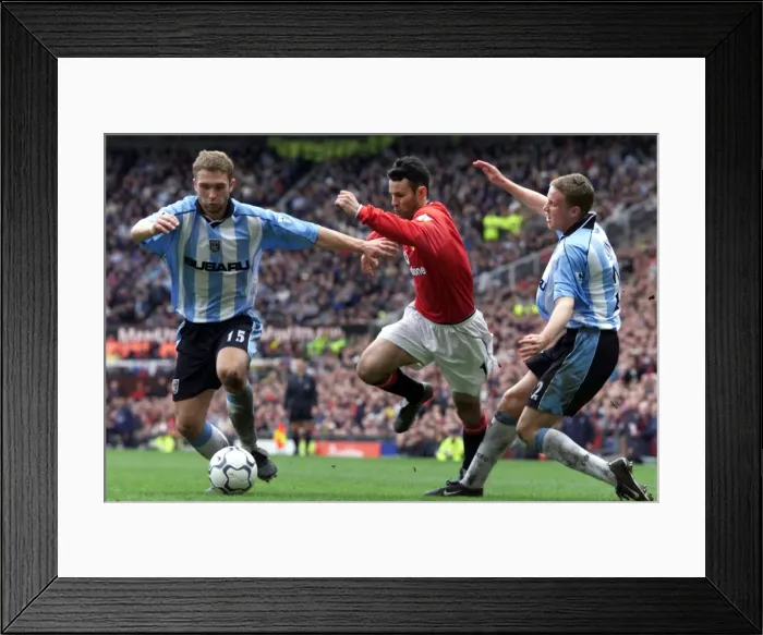 Framed Print : Ryan Giggs Dashes Past Coventry City's Defense at Old Trafford (April 2001) Framed Print : Ryan Giggs Dashes Past Coventry City's Defense at Old Trafford (April 2001)