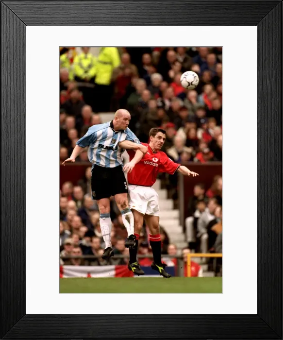 Framed Print : John Hartson's Epic Jump Over Gary Neville: Coventry City vs. Manchester United (Premier League, 2001) Framed Print : John Hartson's Epic Jump Over Gary Neville: Coventry City vs. Manchester United (Premier League, 2001)