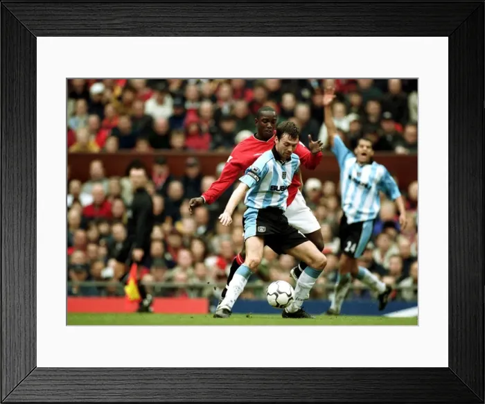 Framed Print : Breen vs Yorke: A Battle at Old Trafford - Coventry City vs Manchester United (FA Carling Premiership, 14-04-2001) Framed Print : Breen vs Yorke: A Battle at Old Trafford - Coventry City vs Manchester United (FA Carling Premiership, 14-04-2001)