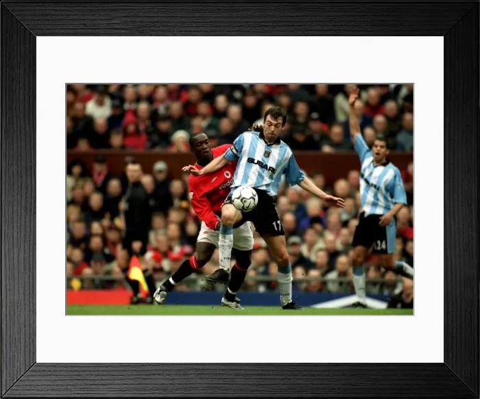 Framed Print : Breen vs Yorke: A Football Battle at Old Trafford - Coventry City vs Manchester United (14-04-2001) Framed Print : Breen vs Yorke: A Football Battle at Old Trafford - Coventry City vs Manchester United (14-04-2001)