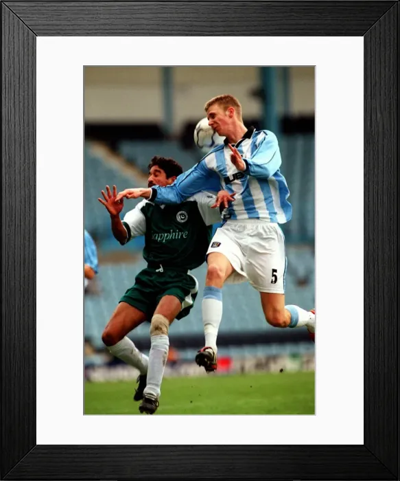 Framed Print : Clash on the Field: Davenport vs Ullah - Coventry City vs Pakistan Friendly Framed Print : Clash on the Field: Davenport vs Ullah - Coventry City vs Pakistan Friendly