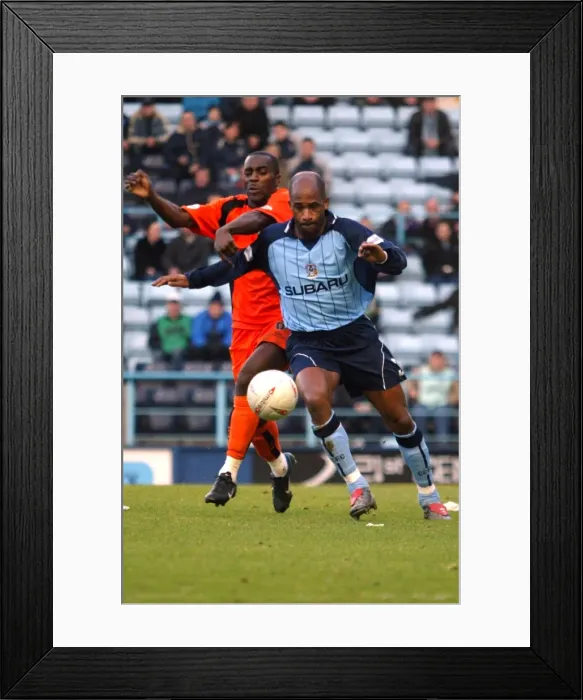 Framed Print : Dean Gordon vs Wayne Andrews: Coventry City vs Colchester United FA Cup Fourth Round Clash (2004) - Shielding Battle Framed Print : Dean Gordon vs Wayne Andrews: Coventry City vs Colchester United FA Cup Fourth Round Clash (2004) - Shielding Battle