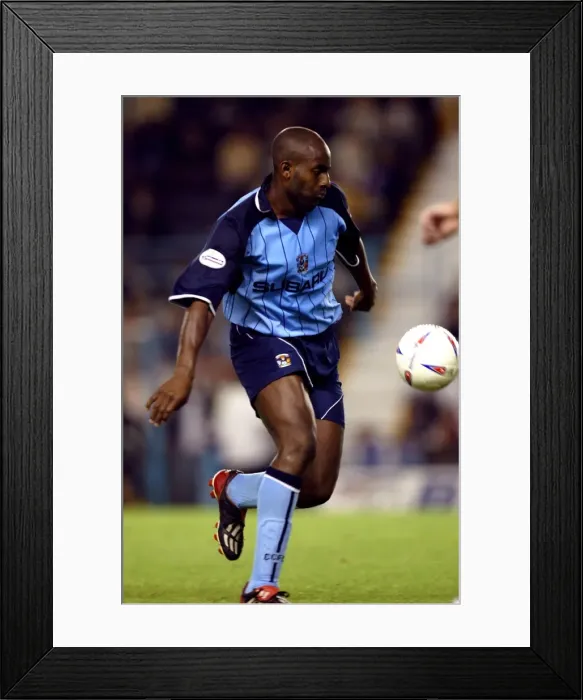 Framed Print : Determined Dele Adebola: Coventry City's Battle Against Nottingham Forest (2003) Framed Print : Determined Dele Adebola: Coventry City's Battle Against Nottingham Forest (2003)
