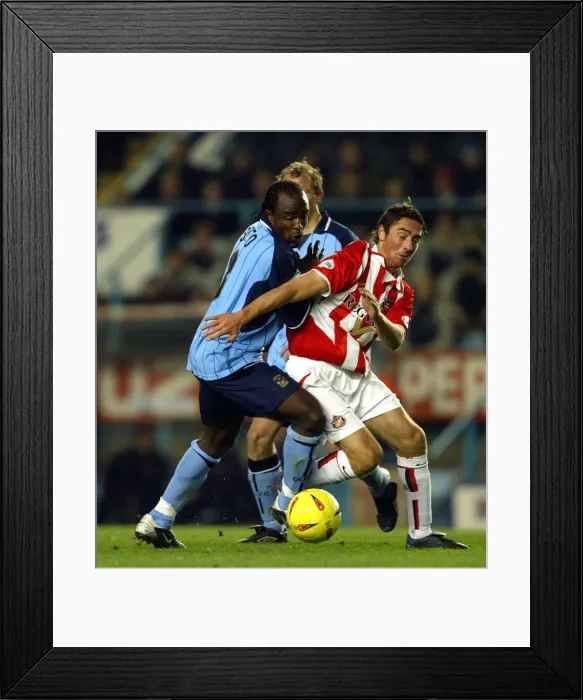 Framed Print : A Fight for Supremacy: Coventry City vs. Sunderland - Intense Rivalry on the Division One Field: Patrick Suffo vs. Tommy Smith Framed Print : A Fight for Supremacy: Coventry City vs. Sunderland - Intense Rivalry on the Division One Field: Patrick Suffo vs. Tommy Smith