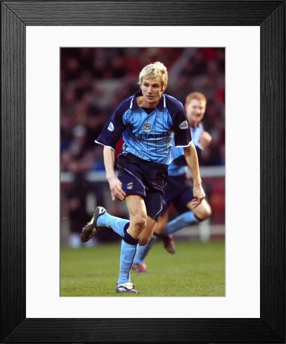 Framed Print : Clash in Division One: Coventry City's Calum Davenport Braces Defense Against Nottingham Forest (07-02-2004) Framed Print : Clash in Division One: Coventry City's Calum Davenport Braces Defense Against Nottingham Forest (07-02-2004)