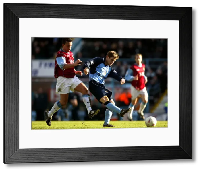 Framed Print : Determined Duel: Gudjohnsson's Defiant Shot vs. Weller's Pressure (Coventry City vs Burnley, Nationwide League Division One, 13-03-2004) Framed Print : Determined Duel: Gudjohnsson's Defiant Shot vs. Weller's Pressure (Coventry City vs Burnley, Nationwide League Division One, 13-03-2004)