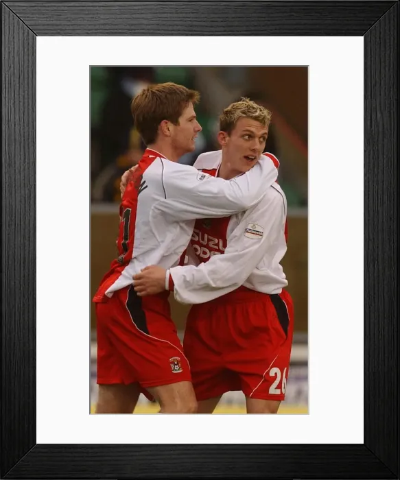 Framed Print : Coventry City's Triumph: Bjarni Gudjonsson and Stephen Warnock's Goal Celebration (2004) Framed Print : Coventry City's Triumph: Bjarni Gudjonsson and Stephen Warnock's Goal Celebration (2004)
