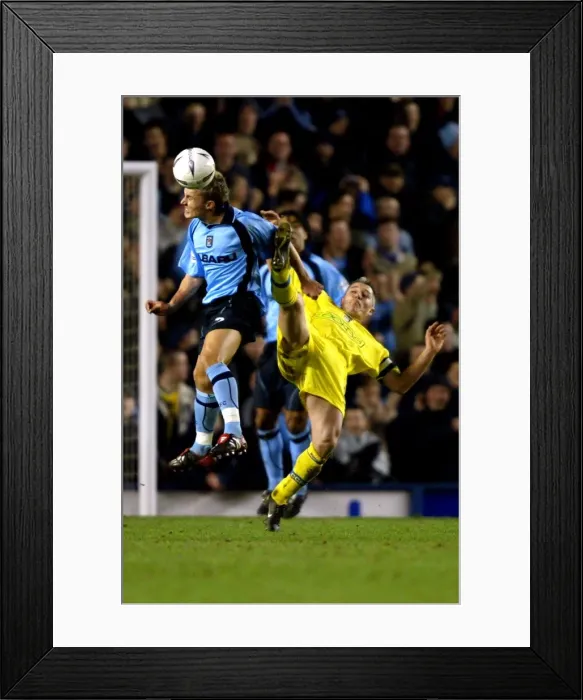 Framed Print : Intense Rivalry: Peed vs Kavanagh's Battle for Ball in Coventry City's FA Cup Clash against Cardiff City (January 15, 2003) Framed Print : Intense Rivalry: Peed vs Kavanagh's Battle for Ball in Coventry City's FA Cup Clash against Cardiff City (January 15, 2003)