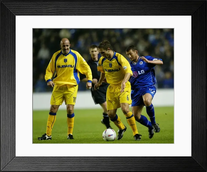 Framed Print : Coventry City vs Leicester City: Eustace Defends Against McKinlay in Intense Division One Clash (2002) Framed Print : Coventry City vs Leicester City: Eustace Defends Against McKinlay in Intense Division One Clash (2002)