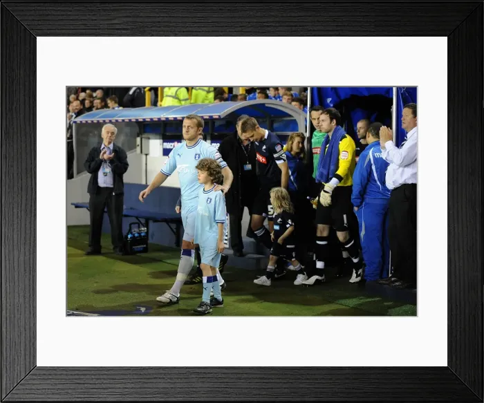 Framed Print : Sammy Clingan Leads Coventry City Out at The Den for Npower Championship Match against Millwall (November 1, 2011) Framed Print : Sammy Clingan Leads Coventry City Out at The Den for Npower Championship Match against Millwall (November 1, 2011)