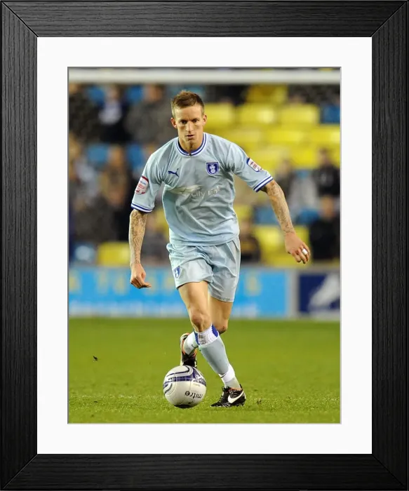 Framed Print : Championship Showdown at The Den: Coventry City vs Millwall - Carl Baker in Action Framed Print : Championship Showdown at The Den: Coventry City vs Millwall - Carl Baker in Action
