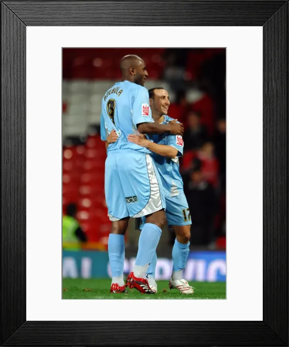 Framed Print : Coventry City's Historic Double Victory: Dele Adebola and Michael Mifsud Celebrate Upset Over Manchester United in Carling Cup (September 26, 2007) Framed Print : Coventry City's Historic Double Victory: Dele Adebola and Michael Mifsud Celebrate Upset Over Manchester United in Carling Cup (September 26, 2007)