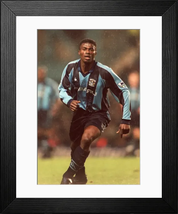 Framed Print : George Boateng Stands Firm Against Manchester United: A Tense Moment in Coventry City's FA Carling Premiership (December 1997) Framed Print : George Boateng Stands Firm Against Manchester United: A Tense Moment in Coventry City's FA Carling Premiership (December 1997)