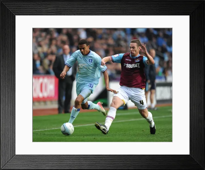 Framed Print : Battle of the Midfield: Cyrus Christie vs. Kevin Nolan - Coventry City vs. West Ham United, Npower Championship (November 19, 2011) at Ricoh Arena Framed Print : Battle of the Midfield: Cyrus Christie vs. Kevin Nolan - Coventry City vs. West Ham United, Npower Championship (November 19, 2011) at Ricoh Arena